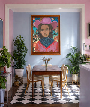 Cowboy With Flowers shown framed by Crum Art