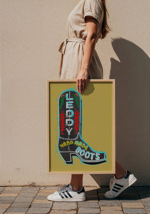 Leddy Boot Ochre cowboy boot art print by Betsy Crum — framed with velvet mat