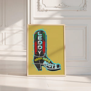 Leddy Boot Ochre cowboy boot art print by Betsy Crum — neutral frame room mockup