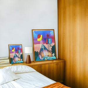 Armadillo UFO Spaceship desert art print by Caya Crum — framed in a wood-accent room