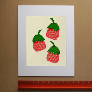 Cute Strawberry Candy Wall Decor perfect for that cozy kitchen space or reading nook.  It's cottage core and nostalgia and I love it.  Takes me back to my grandma's house in the 80s; matted print by Betsy Crum