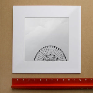 Texas Star Ferris Wheel art print by Betsy Crum shown matted in white