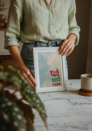 Felix Restaurant Houston art print by Betsy Crum — neutral frame room mockup