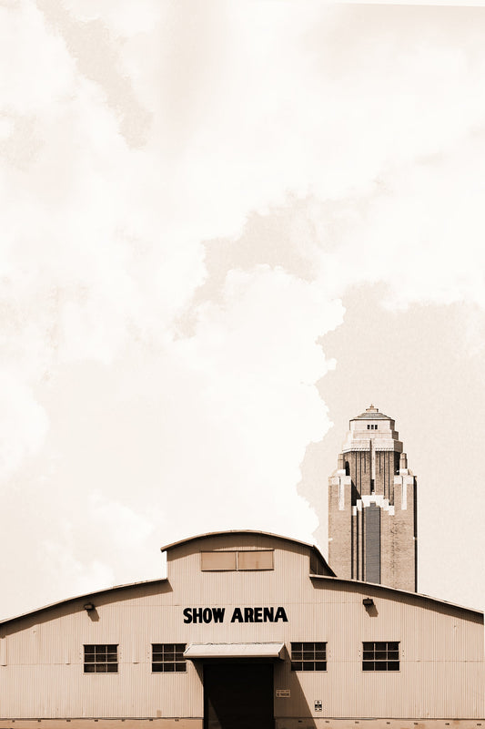 Fort Worth Show Arena and Will Rogers Tower Art Print by Betsy Crum, inspired by the Will Rogers grounds, Fort Worth Stock Show and Rodeo memories, and a dramatic Texas sky over the Show Arena Barn and Pioneer Tower, available at crumart.com. This museum quality print is made right here in Texas.