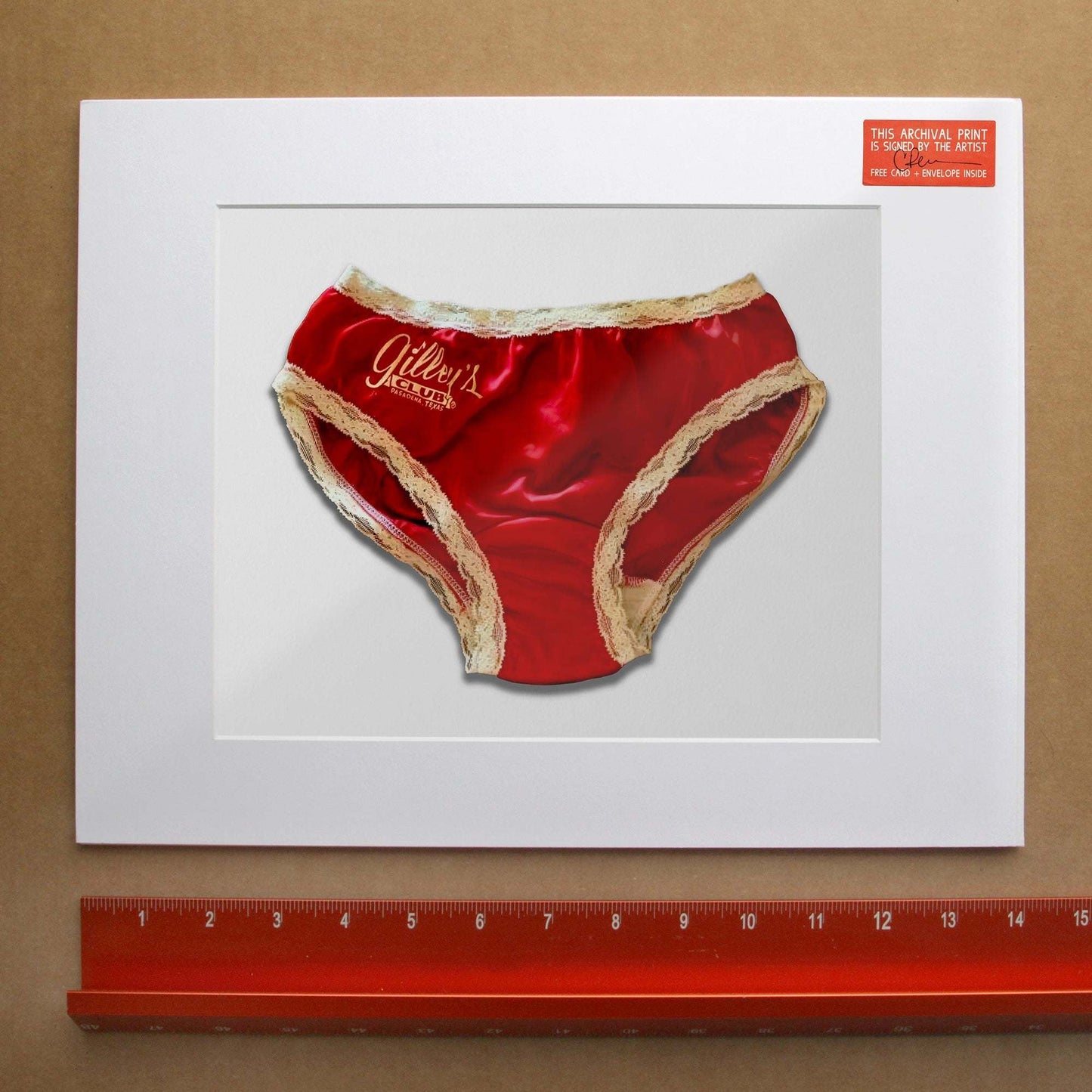 Gilley's Urban Cowboy Print of red panties print with lace trim framed western art by Crum Art