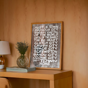 Houston Nicknames Houston art print by Betsy Crum — framed in a wood-accent room