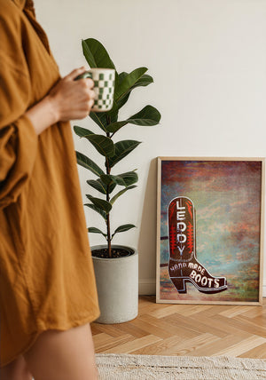 Leddy Boots Big Sky cowboy boot art print by Betsy Crum — framed with velvet mat
