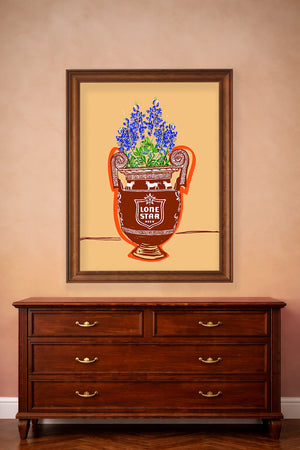 Lone Star and bluebonnets art print by Betsy Crum shown in a frame mockup