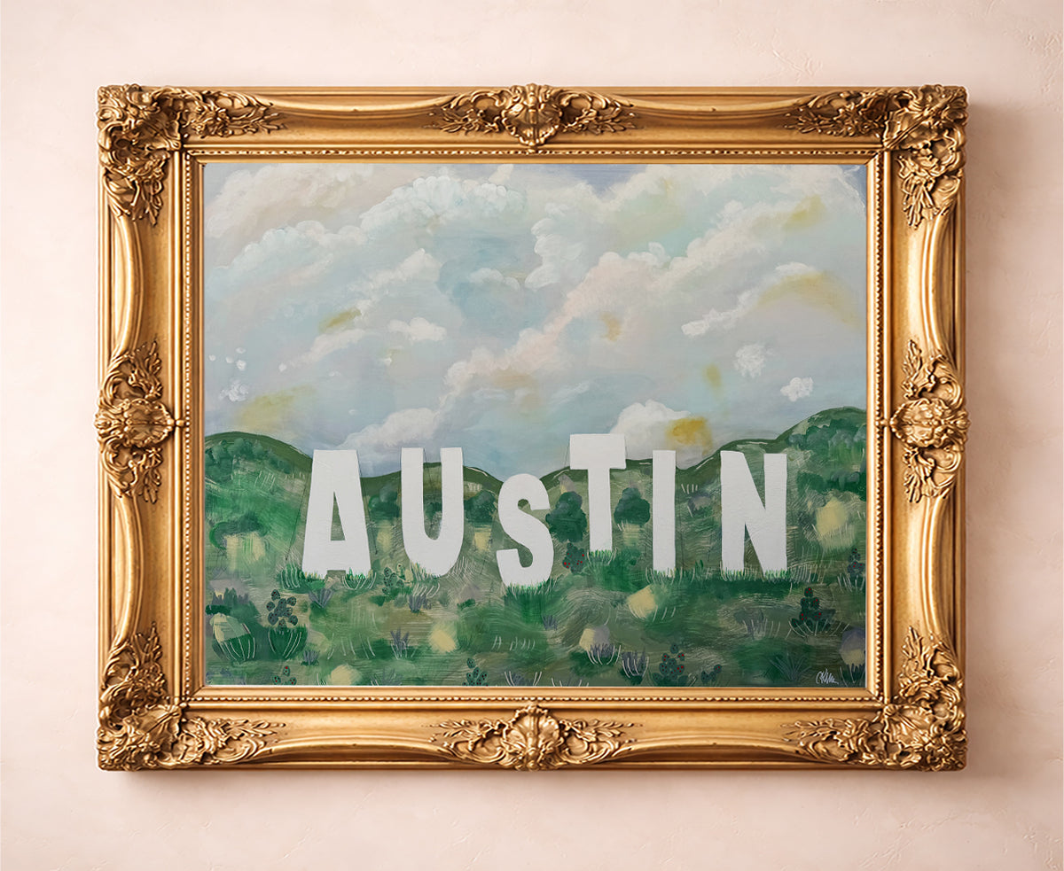 Austin wall art Hollywood style sign print by Betsy Crum in a gold frame room scene