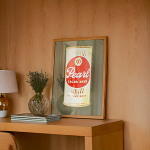 Pearl Bottle Last Light bar wall art print by Betsy Crum — framed in a wood-accent room