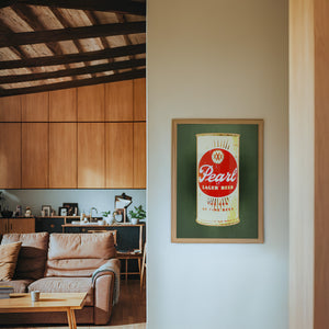 Pearl Bottle Last Light bar wall art print by Betsy Crum — framed in a wood-accent room