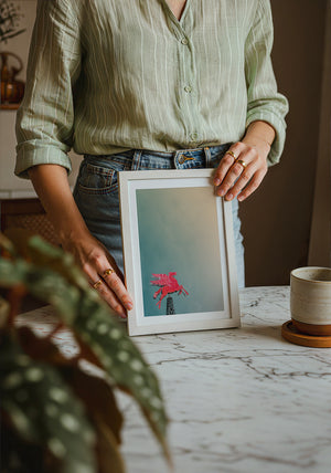 Pegasus Flying Red Horse Dallas art print by Betsy Crum — neutral frame room mockup