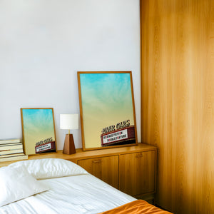 River Oaks Theatre Houston art print by Betsy Crum — framed in a wood-accent room