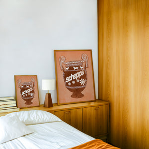 Schepps Milk Amphora kitchen art print by Betsy Crum — framed in a wood-accent room
