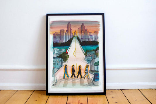 Beatles Crossing South Congress Austin Texas art print by Caya Crum in black frame on wooden floor