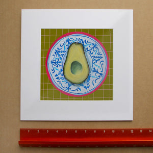 Avocado on a chinoiserie plate print by Caya Crum — square matted format