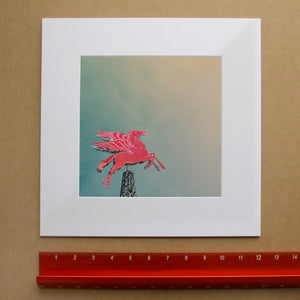 Pegasus Flying Red Horse shown as a matted art print by Crum Art — square matted print, available at crumart.com. This museum quality print is made right here in Texas.