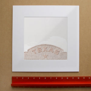 Marfa Building Print shown as a matted art print by Crum Art — square matted print, available at crumart.com. This museum quality print is made right here in Texas.