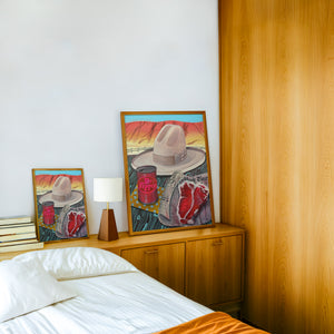 Stetson, Steak & Dr Pepper western art print by Caya Crum — framed in a wood-accent room