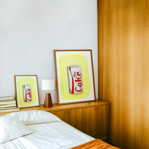 Diet Coke Painting diet coke art print by Tavi Crum — framed in a wood-accent room