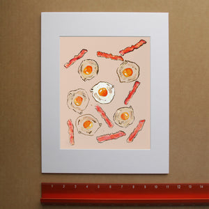 Eggs & Bacon kitchen art print by Tavi Crum — framed room mockup