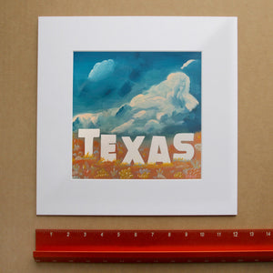 Texas Art - Texas Hollywood Big Sky and Clouds Art Print | Betsy Crum Art in matted square frame mockup