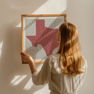 Texas Singer Songwriters print by Carl Crum framed on a wall beside a seated figure, for scale