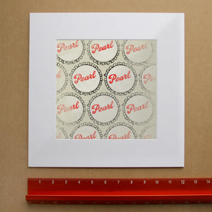 Pearl Beer bottle caps art print by Betsy Crum shown matted in white