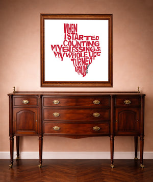Willie Nelson quote art print by Betsy Crum shown in a western styled room