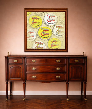 Topo Chico bottle caps art for the office by Betsy Crum, framed 24x24