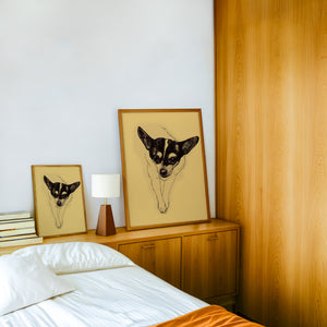 Edie the Rodeo Dog art print by Caya Crum — framed in a wood-accent room