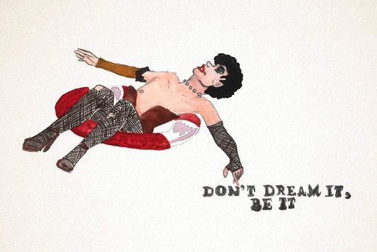 Rocky Horror Picture Show art print featuring a character in fishnet stockings with text "Don't Dream It, Be It" on white background