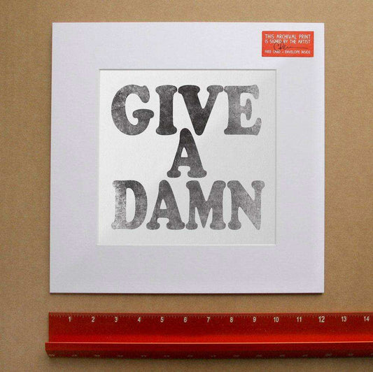 Give A Damn Art Print by Betsy Crum on cotton rag paper with bold typography wall art by Crum Art Texas