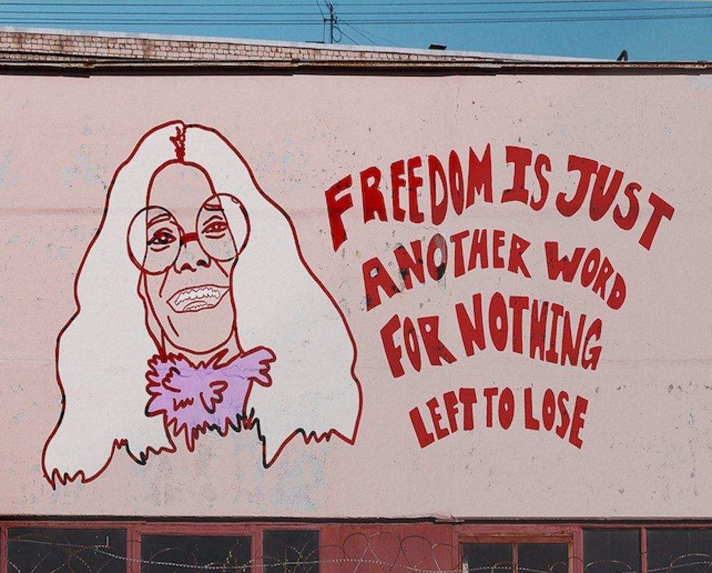 Janis Joplin mural street art with quote freedom is just another word for nothing left to lose