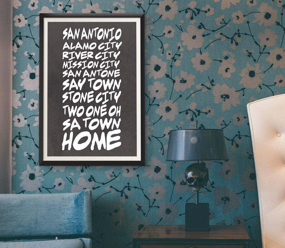 San Antonio Nicknames art print by Betsy Crum in black and white framed on floral wallpaper wall