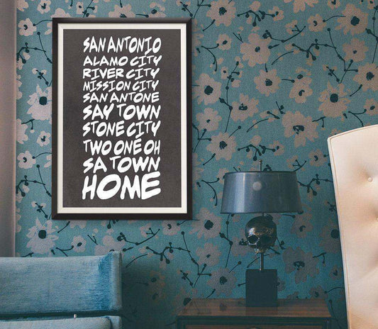 San Antonio Nicknames art print by Betsy Crum in black and white framed on floral wallpaper wall