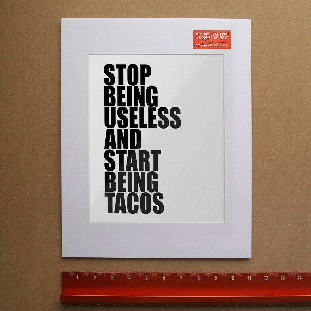 Stop Being Useless And Start Being Tacos black text art print on white cotton rag paper by Betsy Crum