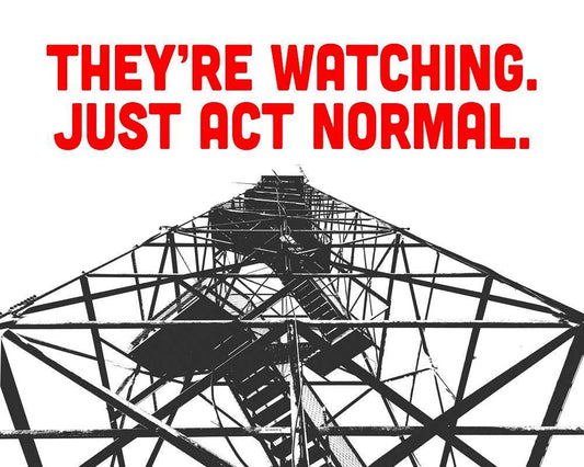 Black and white image of a metal tower structure with red text above saying "They're Watching. Just Act Normal."