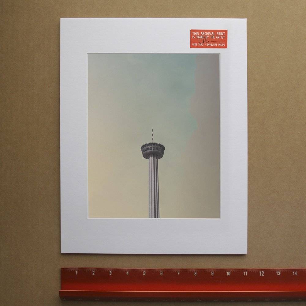 Tower of the Americas framed print with blue sky.