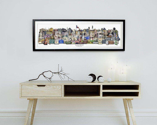 State of Texas classic photomontage art print by Carl Crum in black frame above modern wooden console table