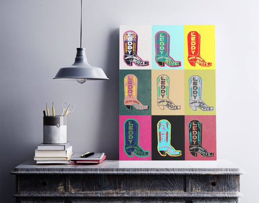 Leddy Warhol Fort Worth Handmade Boots sign pop art print with colorful repeated boot designs on heavyweight paper displayed on rustic wooden table