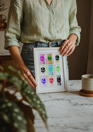 Nine Pearl Cans bar wall art print by Betsy Crum — neutral frame room mockup