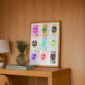 Nine Pearl Cans bar wall art print by Betsy Crum — framed in a wood-accent room