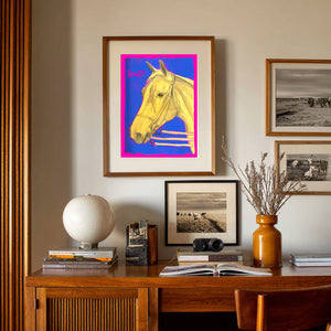 Western Wall Art of a horse in a pop art style with pink and blue and the word Howdy written in hot pink.