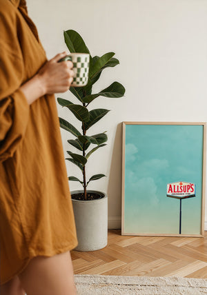 Allsup's Under a Big Sky Texas Art print by Betsy Crum — framed with velvet mat