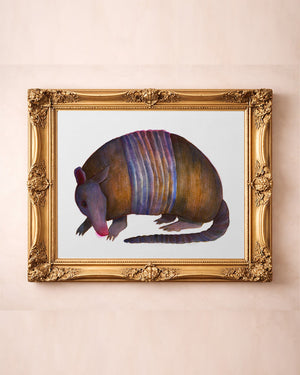 Watercolor Armadillo art print by Caya Crum — in a gold frame