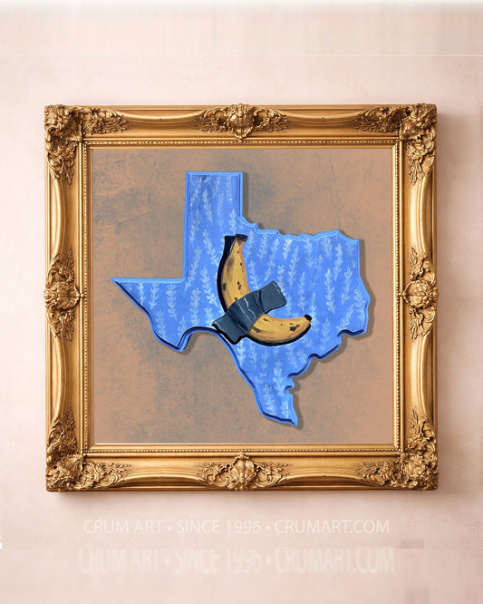 Banana Taped to Texas art print in a gold frame by Caya Crum — a banana duct-taped across a blue Texas-shaped plaque, funny wall art available at crumart.com. This museum quality print is made right here in Texas.