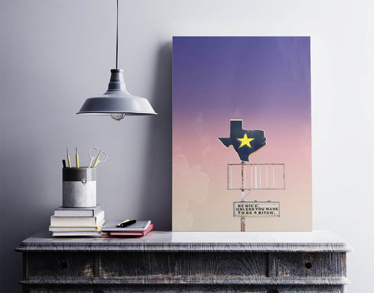 Be Nice Unless You Have to Be a Bitch Texas style museum quality print on cotton paper with archival inks displayed on wooden table under a hanging lamp
