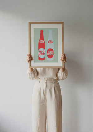 Big Red Two Bottles kitchen print by Betsy Crum — framed with velvet mat