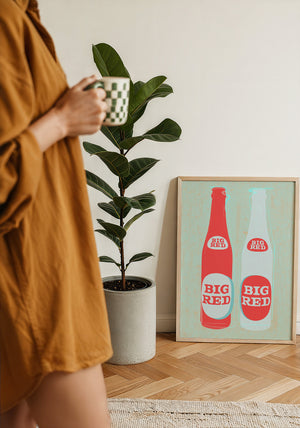 Big Red Two Bottles kitchen print by Betsy Crum — framed with velvet mat